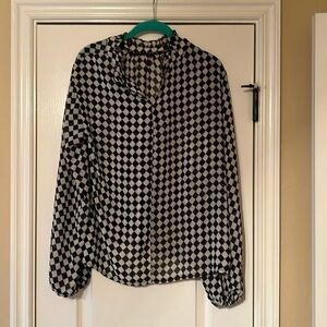 Sheer black and white harlequins print blouse